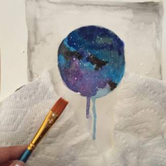 Creating stars via white paint splatters! Also one of my fave things to do at the end.
